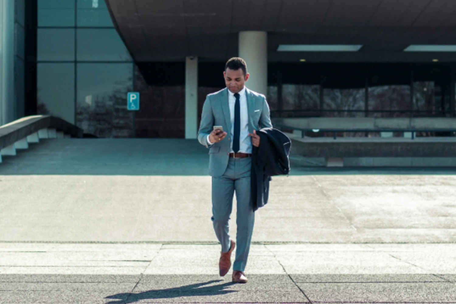 Two businessmen having a smartphone
